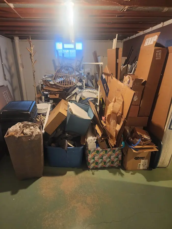 Roll-off dumpster container at job site for 6 Yard Dumpster Rental in Livingston